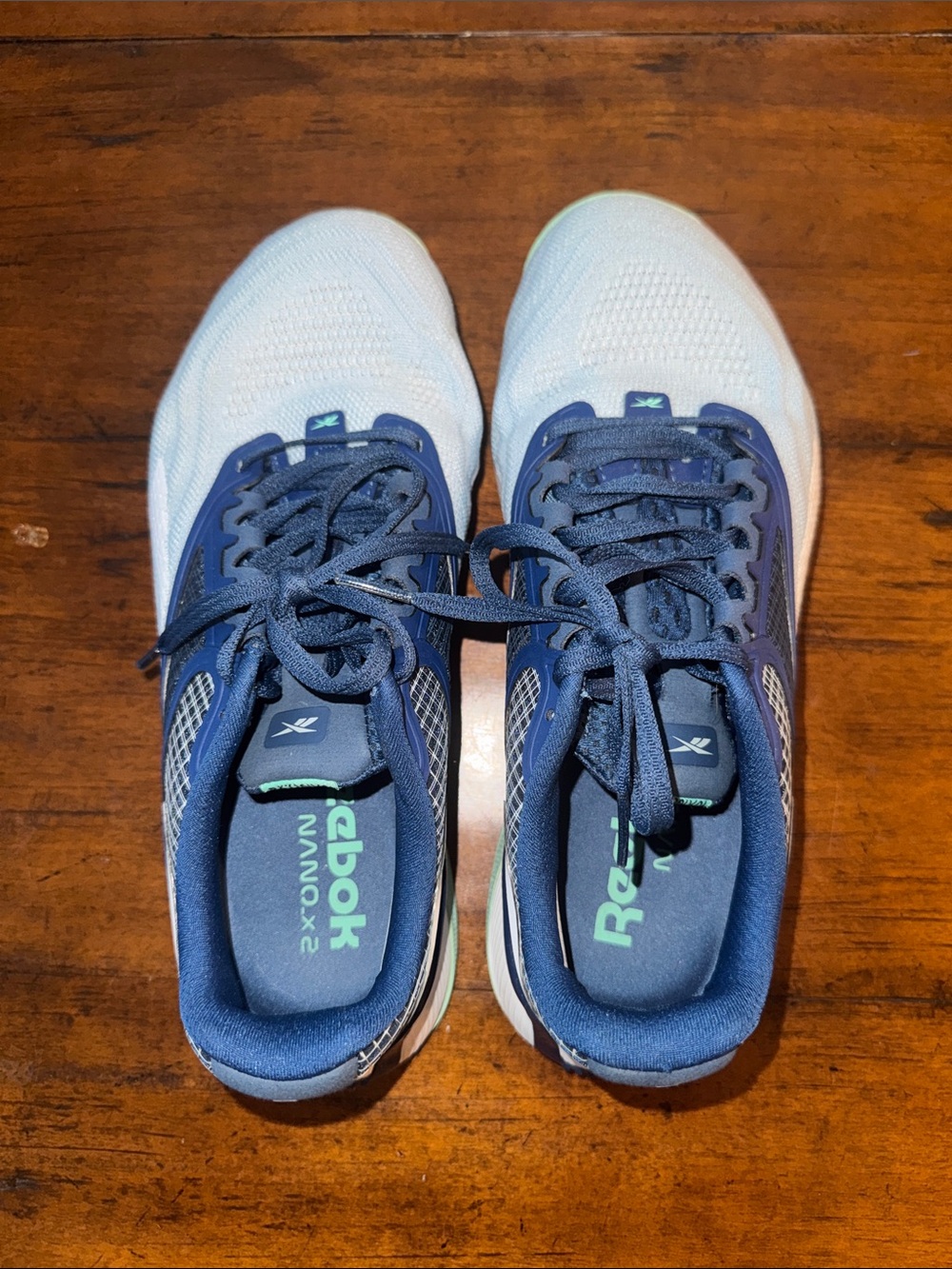Reebok Men's White and Navy Athletic Running Shoes with Teal Accents